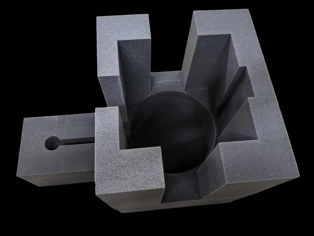 A custom-cut foam insert with shaped supports and equipment cavities