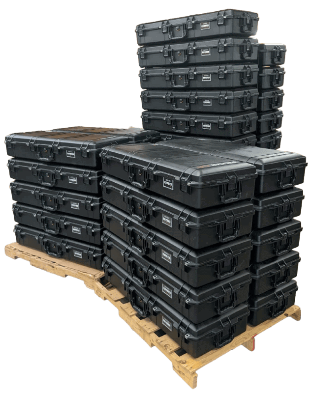 A pallet of completed hard cases prepared for repeat production